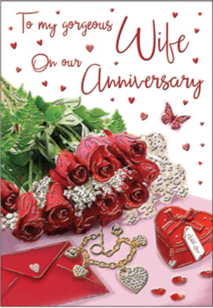 This richly detailed anniversary card design unfolds like a quiet celebration on a New Southgate windowsill, where afternoon light spills across carefully chosen tokens of affection. Dominating the composition is a bouquet of red roses, not vast in size but full in presence. Each rose is in generous bloom, layers of velvety petals unfurling from a deep, passionate centre to softly rounded edges. The flowers are surrounded by sprigs of fresh greenery, the leaves adding shape and texture, and grounding the vivid reds with calm, natural tones. Just beside the floral cluster rests a neatly placed envelope, its soft cream or ivory shade gently illuminated, suggesting a personal note waiting to be read-perhaps penned while looking out towards Arnos Grove or the tree-lined paths near Broomfield Park. A small heart-shaped box, polished and smooth, anchors one corner of the image. Its rich colour and reflective sheen hint that it might contain a sentimental keepsake, a piece of jewellery, or a folded love note from years past. A delicate jewellery piece, slender and refined, lies a short distance away, its subtle sparkle catching the eye in the same way a glint of evening light might dance on a pendant at a local anniversary dinner. Across the background, tiny hearts are scattered as decorative accents, some bold, others faint, forming a gentle cascade of affection. A single butterfly motif appears as if resting momentarily near the roses, adding an airy, romantic touch. The overall palette blends warm reds, muted creams, and soft metallic highlights, bathed in even, flattering light. The result is a scene that feels personal and sincere, like a snapshot of a special anniversary morning when flowers, tokens, and loving words come together in a home in New Southgate.